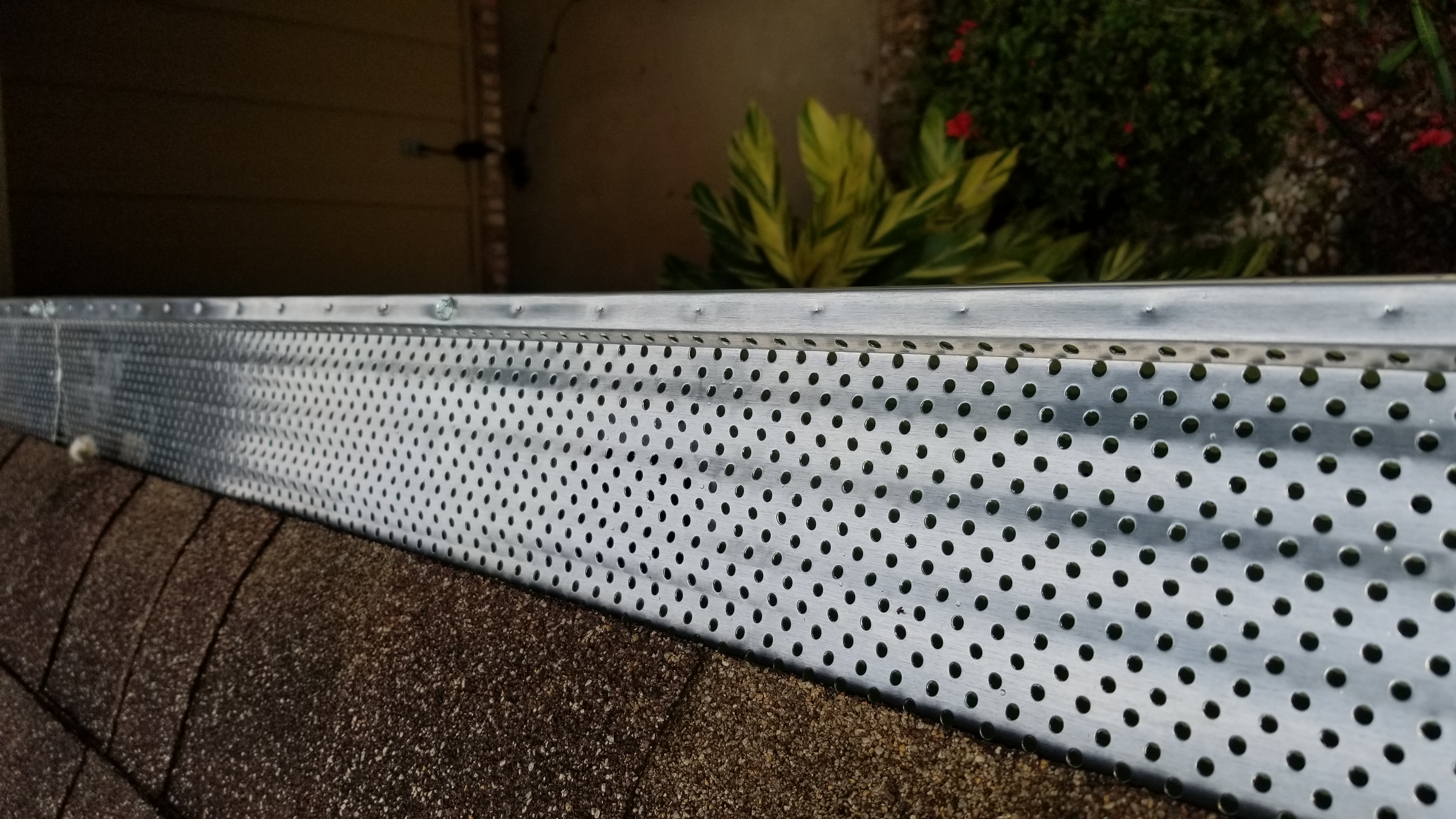 Gutter guard installed over a residential gutter
